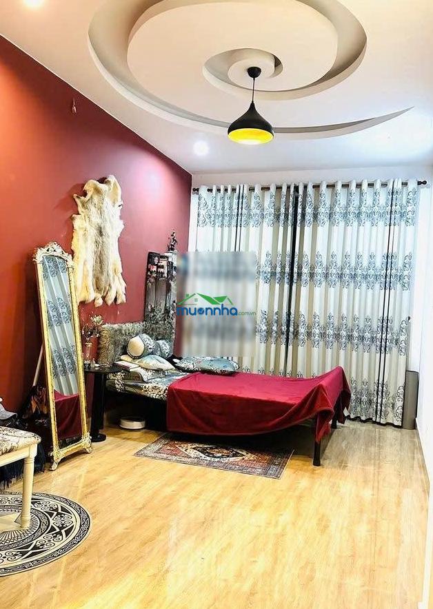 Bán nhà mới 4 tầng - hẻm oto phan đăng lưu thông phan xích long