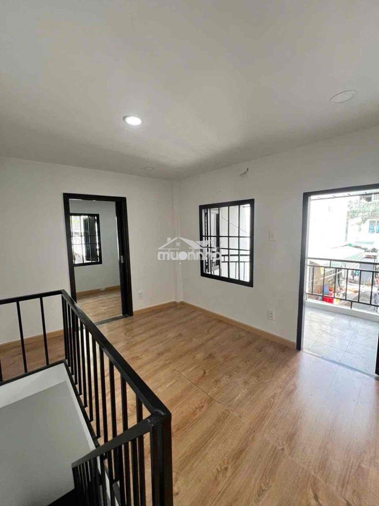 Bán nhà lê quang định 2 lầu 2pn có sân xe sát q1 đang cho thuê 7tr - 2