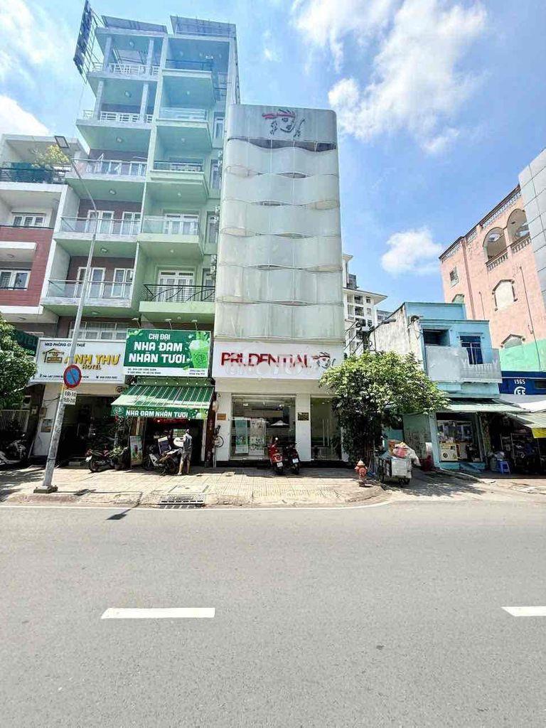 Bán toà nhà góc 2 mt lạc long quân quận 11 dt: 6,3x15 kc: 4 tầng st