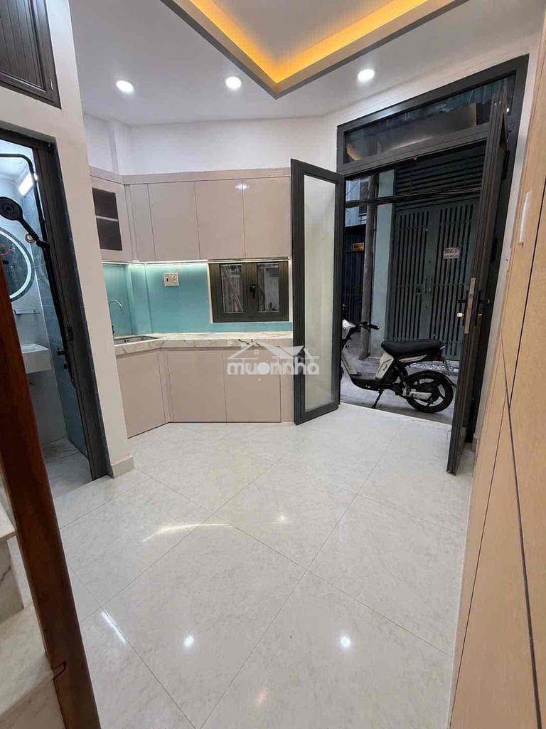 Nhà mới , trệt lầu lửng , sd 30m2 , trước nhà 3m , q4.